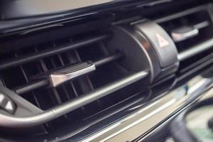 Air conditioner in modern car close up photo