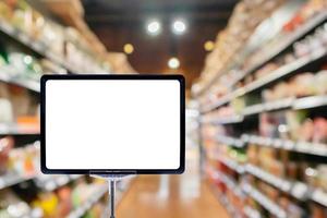 Mock up blank price board poster sign display with supermarket aisle abstract background photo