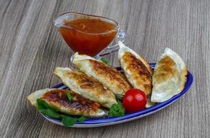 Gyoza on plate photo