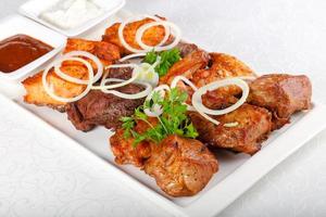 BBQ mix on the plate and white background photo