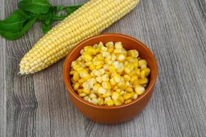 Sweet corn on wood photo