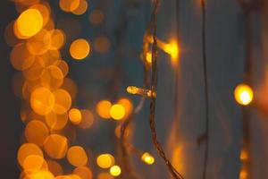 Fondo de vacaciones de Navidad de luz de bokeh dorado abstracto foto