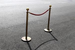 Road barriers along the sidewalk for the safe passage of pedestrians. photo