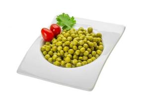 Marinated peas on white photo