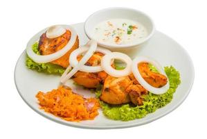 Chicken Tikka on white photo