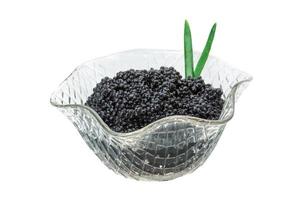 caviar negro sobre blanco foto