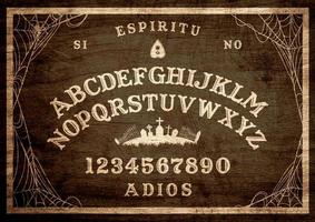 Halloween Ouija Board on wooden texture. Planchette play with calling souls and demons. Party poster. Graphic, caligraphy, typography, alphabet, letters, numbers and web. Cementery skyline. photo