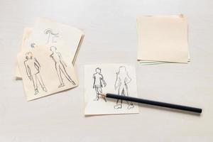 sketches of fashionable silhouette drawn by pencil photo