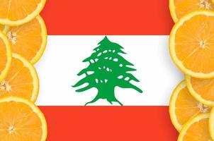 Lebanon flag  in citrus fruit slices vertical frame photo