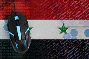 Syria flag  and computer mouse. Digital threat, illegal actions on the Internet photo