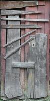 Boarded up wooden door to an old abandoned house photo