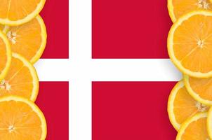 Denmark flag  in citrus fruit slices vertical frame photo