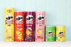 KHARKIV, UKRAINE - DECEMBER 16, 2021 Pringles product with new logo. Pringles is a brand of potato snack chips owned by the Kellogg Company photo