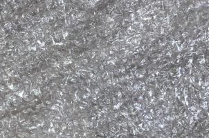 White bubble Wrap Packing Or Air Cushion material. Abstract Texture For Creative Art Work, Close Up dfckground, Top View with Copy Space photo