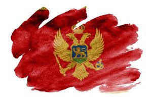 la bandera de montenegro se representa en estilo acuarela líquida aislado sobre fondo blanco foto