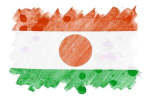 Niger flag  is depicted in liquid watercolor style isolated on white background photo