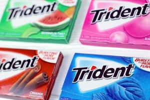 KHARKIV, UKRAINE - MARCH 15, 2021 Packs of Trident gums. Trident was introduced in 1964 as one of the first patented sugarless gums photo