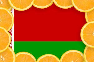 Belarus flag  in fresh citrus fruit slices frame photo