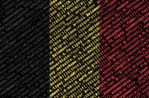 Belgium flag  is depicted on the screen with the program code. The concept of modern technology and site development photo