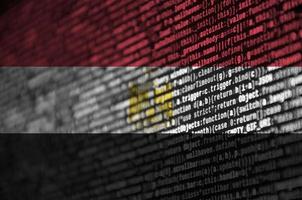 Egypt flag  is depicted on the screen with the program code. The concept of modern technology and site development photo