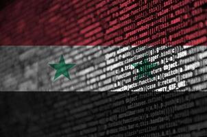 Syria flag  is depicted on the screen with the program code. The concept of modern technology and site development photo