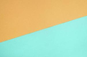Texture background of fashion pastel colors. Yellow, and blue geometric pattern papers. photo
