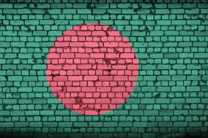 Bangladesh flag is painted onto an old brick wall photo