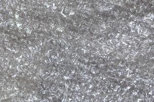 White bubble Wrap Packing Or Air Cushion material. Abstract Texture For Creative Art Work, Close Up dfckground, Top View with Copy Space photo
