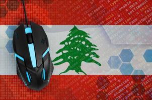 Lebanon flag  and computer mouse. Digital threat, illegal actions on the Internet photo