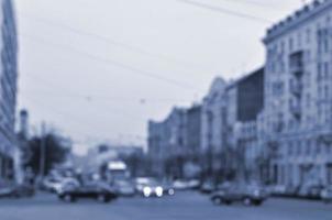 Blurred landscape with a city road during traffic photo