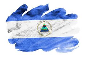 Nicaragua flag  is depicted in liquid watercolor style isolated on white background photo