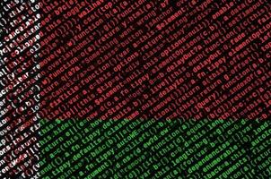 Belarus flag  is depicted on the screen with the program code. The concept of modern technology and site development photo
