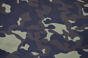 Textile pattern of military camouflage fabric photo