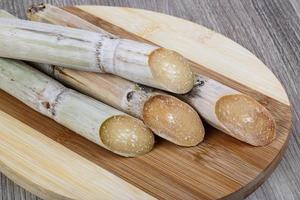 Bamboo shoots on wood photo