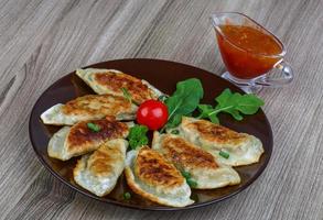 Gyoza on plate photo