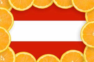 Austria flag  in fresh citrus fruit slices frame photo