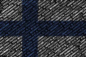 Finland flag  is depicted on the screen with the program code. The concept of modern technology and site development photo