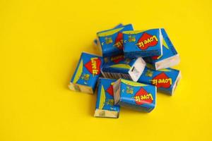 TERNOPIL, UKRAINE - JUNE 23, 2022 Love is - turkish bubble gums from 1990s popular in russian region. Various flavors of Love is chewing gum with liners about love photo