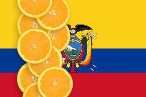Ecuador flag and citrus fruit slices vertical row photo