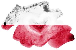 Poland flag  is depicted in liquid watercolor style isolated on white background photo