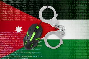 Jordan flag  and handcuffed computer mouse. Combating computer crime, hackers and piracy photo