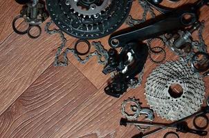 Many different metal parts and components of the running gear of a sports bike photo