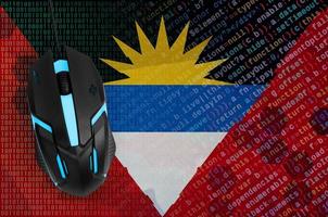 Antigua and Barbuda flag  and computer mouse. Digital threat, illegal actions on the Internet photo