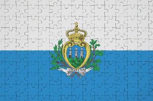 San Marino flag  is depicted on a folded puzzle photo