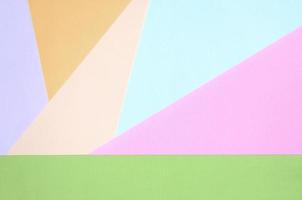 Texture background of fashion pastel colors. Pink, violet, orange, green, beige and blue geometric pattern papers photo