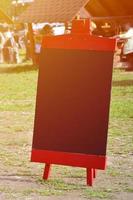A large board as a menu for an open-air restaurant in a mountainous area. Free space for your text photo