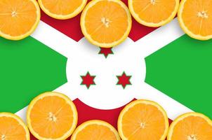 Burundi flag  in citrus fruit slices horizontal frame photo