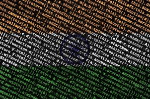 India flag  is depicted on the screen with the program code. The concept of modern technology and site development photo