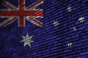 Australia flag  is depicted on the screen with the program code. The concept of modern technology and site development photo