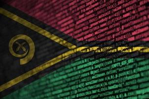 Vanuatu flag  is depicted on the screen with the program code. The concept of modern technology and site development photo